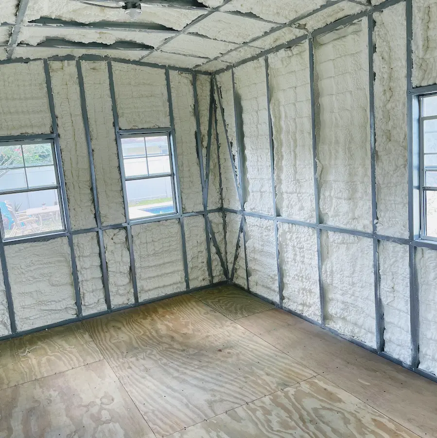 Closed-cell spray foam insulation applied to wall cavities in a residential project in Otsego